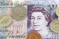 British Pound (GBP) coin Pound notes close-up. Coins on a banknote as a financial concept Royalty Free Stock Photo