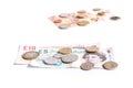 British Pound notes and coins and Euro notes and coins on white Royalty Free Stock Photo