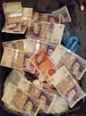 British Pound Sterling notes. Money in a traveler`s suitcase Royalty Free Stock Photo