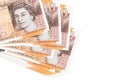 10 British pounds bills lies in small bunch or pack isolated on white. Mockup with copy space. Business and currency exchange