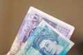 British Pounds bills stretched out. Twenty and five bank notes spread out. Royalty Free Stock Photo