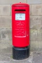 A bi-lingual British Red Postbox Royalty Free Stock Photo