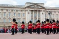 British Royal guards, the Military Band perform the Changing of the Guard in Buckingham Palace Royalty Free Stock Photo