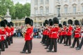 British Royal guards perform the Changing of the Guard in Buckingham Palace, London, England, Gre Royalty Free Stock Photo