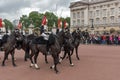 British Royal guards perform the Changing of the Guard in Buckingham Palace, London, England, Gre Royalty Free Stock Photo