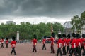 British Royal guards perform the Changing of the Guard in Buckingham Palace, London, England, Gre Royalty Free Stock Photo