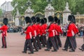 British Royal guards perform the Changing of the Guard in Buckingham Palace, London, England, Gre Royalty Free Stock Photo