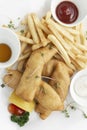 british traditional fish and chips meal in restaurant on white plate Royalty Free Stock Photo