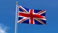 British UK United Kingdom Flag Country 3D Rendering in Blue Sky Background Royalty Free Stock Photo