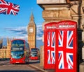 British Union flags on phone booths against Big Ben in London, England, UK Royalty Free Stock Photo