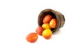 British Victoria Plums in Wooden Pot and on White Background