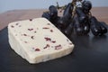 British Wensleydale cheese with long black grapes Royalty Free Stock Photo