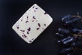 British Wensleydale cheese with long black grapes Royalty Free Stock Photo