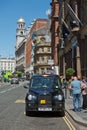 Britsh vintage taxi cab on the streets of Liverpool Royalty Free Stock Photo