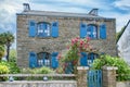 Brittany, Ile aux Moines island, a typical house with a rosebush