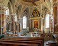 BRIXEN - BRESSONONE, ITALY - AUGUST 31, 2019: Angle view inside the Parish Church of Saint Michael Archangel, showing altar.