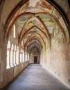 BRIXEN - BRESSONONE, ITALY - AUGUST 31, 2019: View of Cathedral cloister, with frescoes of Bible scenes.