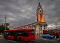 Brixton, London, UK: Lambeth Town Hall on Brixton Hill with red London buses