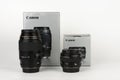 Two lens Canon EF 100 mm f 2,8 and Canon EF 50 mm f 1,4 with boxes
