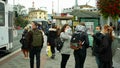 BRNO, CZECH REPUBLIC, JUNE 22, 2020: Coronavirus mask face tram streetcar stop crowd people women girls passengers they