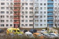 Brno, Czech Republic, March, 03,2021 - An ambulance stands on the road in front of a panel house. The ambulance came to treat the