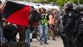 BRNO, CZECH REPUBLIC, MAY 1, 2017: Police riot unit oversees, czech activists Antifa protest against extremists