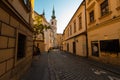 A narrow and ancient alley in the old city of Brno - a bright sunny day