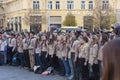 Scouts making the three-finger salute on celebration of Velvet Revolution