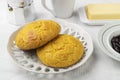 Broa, typical brazilian corn flour bread with coffee,jam and butter Royalty Free Stock Photo