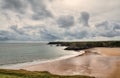 Broad Haven, Pembrokeshire, under a stormy sky.