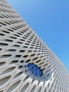 The Broad Museum in Los Angeles, CA on a clear blue sunny day.