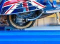 Broad Street, Oxford, United Kingdom, January 22, 2017: Union Jack flag painted Piapgio Vespa Motor Scooter with empty old