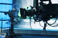 Broadcast television studio camera and crane camera in news studio room Royalty Free Stock Photo