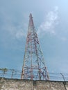 Broadcast Tower Standing Tall in Blue Sky Royalty Free Stock Photo