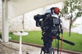 Broadcast tv; movie shooting or video production and film, tv crew team with camera Royalty Free Stock Photo