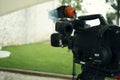 Broadcast tv; movie shooting or video production and film, tv crew team with camera Royalty Free Stock Photo