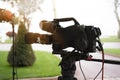 Broadcast tv; movie shooting or video production and film, tv crew team with camera Royalty Free Stock Photo