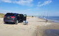 Broadkill Beach, Delaware, U.S - May 16, 2022 - A Jeep Cherokee parked on the beach overlooking the surfishing rods