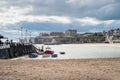 A collection of colourful Small wooden boats moored on Viking Bay on an autumn day