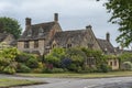 Thatched cottages with climbing plants in the village of Broadway, in the English county of Worcestershire, Cotswolds, UK Royalty Free Stock Photo