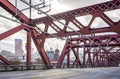 Broadway metal drawbridge over the Willamette River overlooking Portland down town and cloudy sky