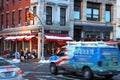 Broadway st and Broome st, Soho Cafe, in New York City during winter daytime. Royalty Free Stock Photo