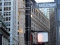 Broadway Street sign, with skyscraper in the background, New York City, USA Royalty Free Stock Photo