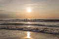 broadways sea at the sunset with eroded wood poles from walkway in the sea