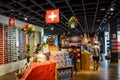 Broc, Switzerland - July 27, 2019: Visitors of the famous Cailler chocolate factory buying chocolate souvenirs in the local shop.