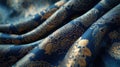 brocade fabric, focusing on the rich, decorative patterns and vibrant blue color, fully occupying the screen with its Royalty Free Stock Photo