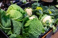 Broccoflower, cauliflower, broccoli, cabbage at market