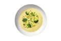 Broccoli Cheddar Soup On White Plate On A White Background