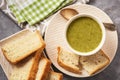 Broccoli cream soup with bread, vegetarian food. Royalty Free Stock Photo