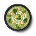 Broccoli cream soup with croutons isolated on white background, top view Royalty Free Stock Photo